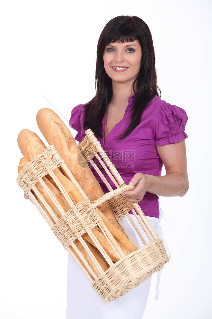 女人的篮子满是面包图片