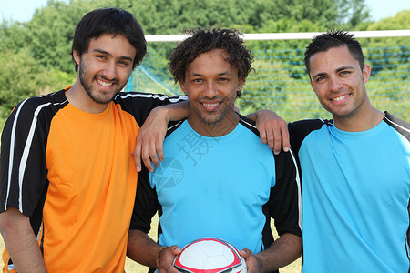 足球运动员微笑娱乐训练团队男人男性闲暇白色球员活动运动背景图片
