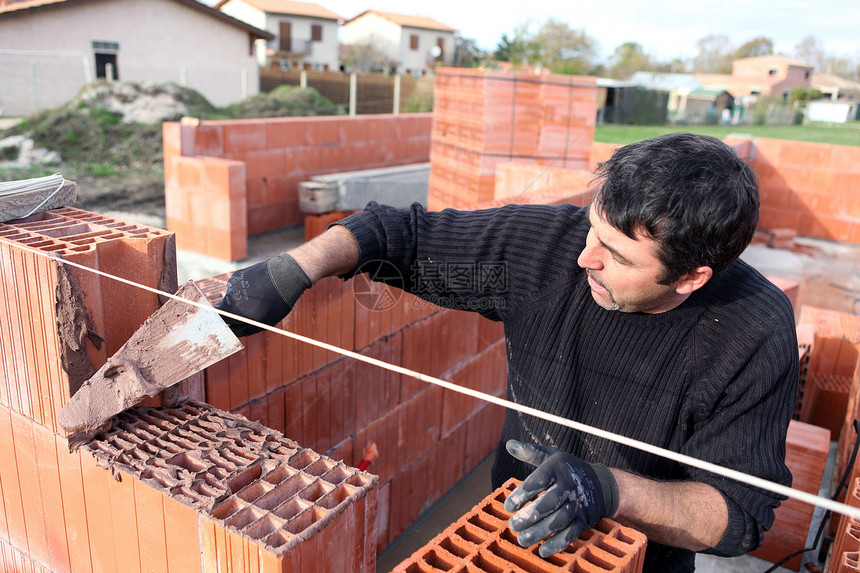 Bricklayer 盖一栋房子瓦工职员建筑工人工作石工住房手套建设者工具图片