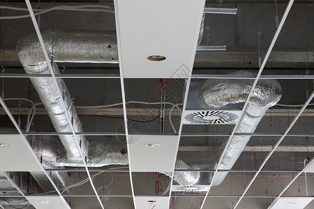 施工上限安装吊顶电缆金属空调维修建筑装修建造管子背景图片