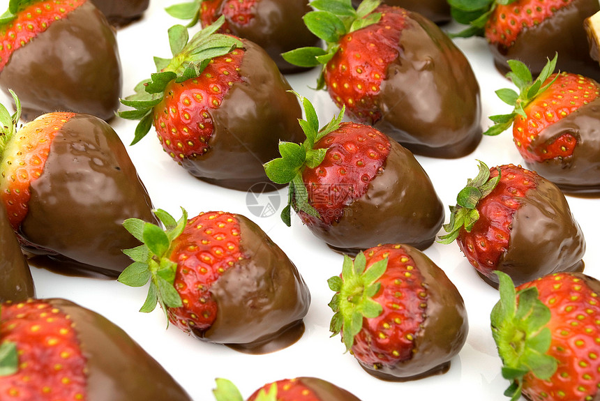 草莓和巧克力叶子小吃美食食物水果液体庆典甜点糖果浆果图片