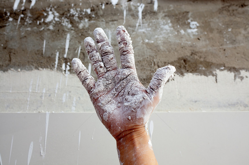 以石膏破碎的石膏手手指工匠工作职业艺术建造拼装建筑房间水泥图片