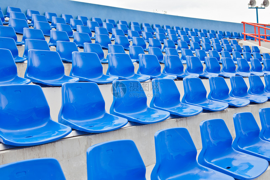 泰国一个体育场的塑料蓝色座椅人群团队运动空白扇子杯子大厅音乐会场地站立图片