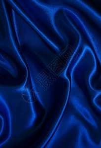 平滑优雅的蓝色丝绸折痕纺织品曲线银色织物布料材料海浪投标背景图片