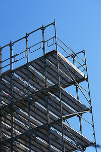 建筑建造活动框架天空金属蓝色梯子背景图片