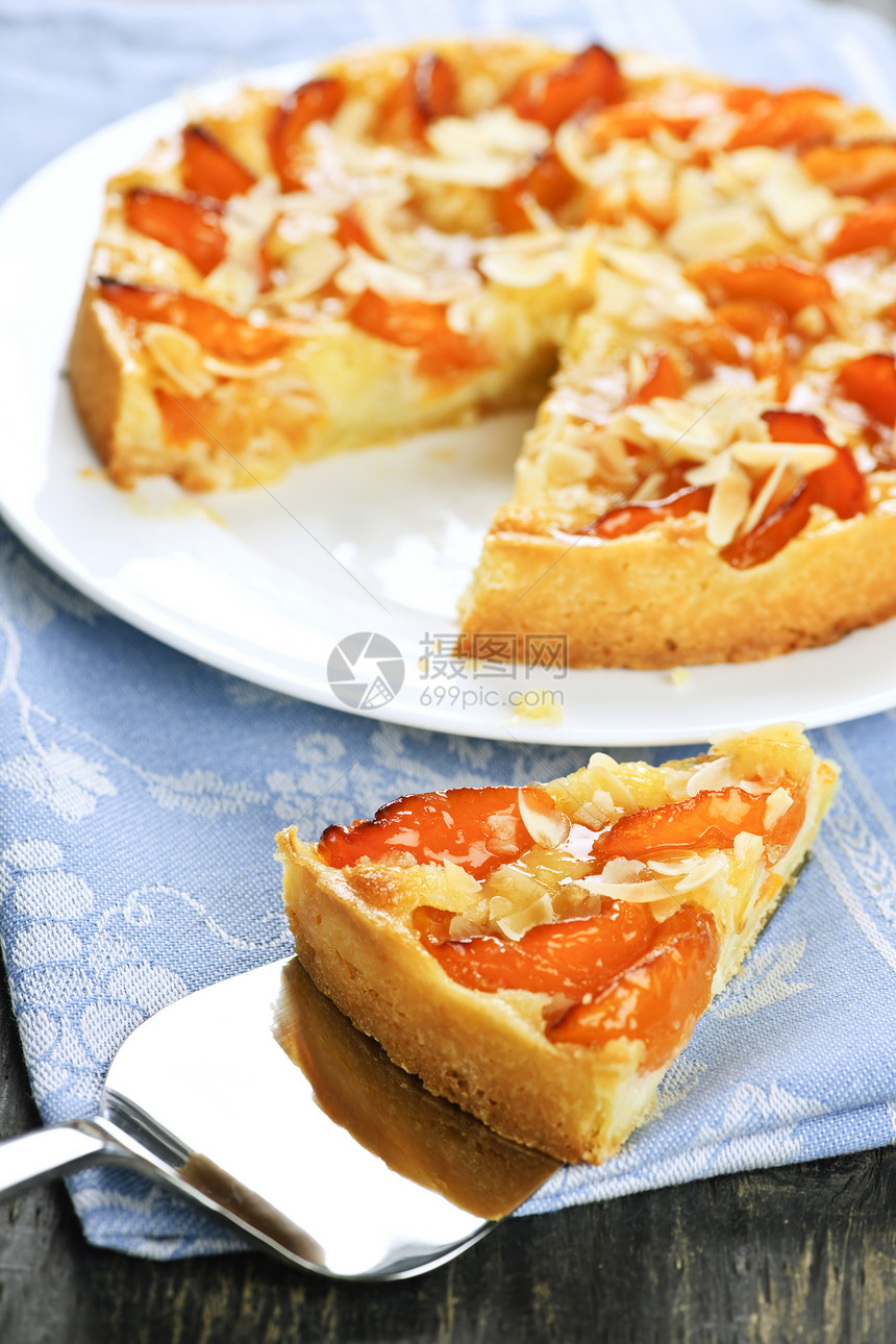 杏和杏圆饼盘子烘烤面包橙子条子蛋糕食物服务器脆皮美食图片