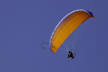 动力滑翔伞螺旋桨引擎高度自由旅行发动机段落翅膀运动空气背景图片