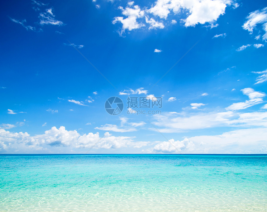 海 海蓝色天空天堂海岸假期支撑太阳冲浪旅行热带图片