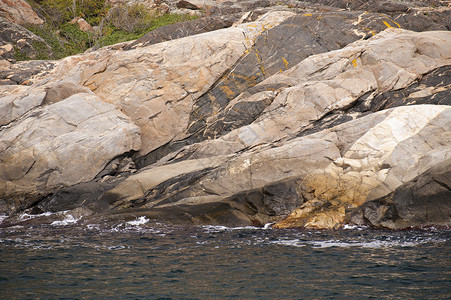 斯凯里岩群岛花岗岩材料海岸石头岩石蓝色岛屿背景