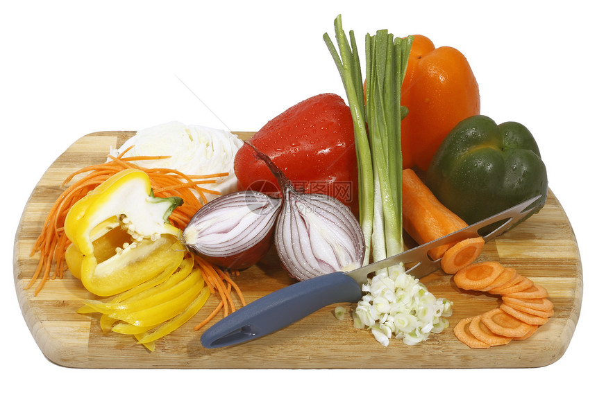 木板上的蔬菜活生生羽毛黄色植物胡椒薯条金属食物红色洋葱白色图片