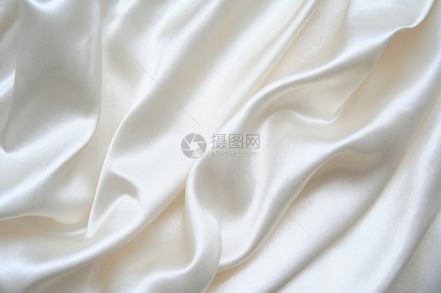 平滑优雅的白色丝绸作为背景版税投标材料折痕新娘寝具生产奢华海浪衣服图片