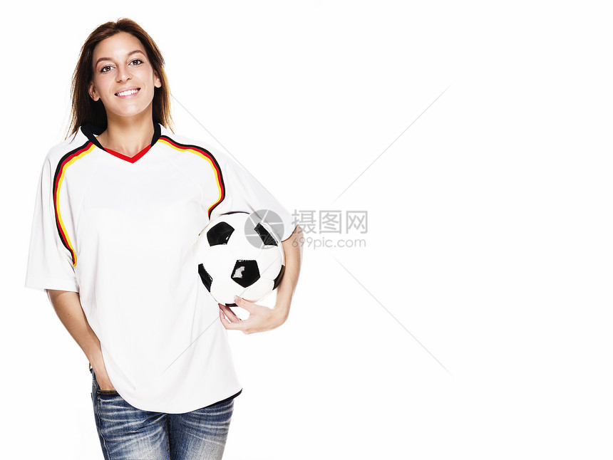 身着足球球衣的快乐女子图片