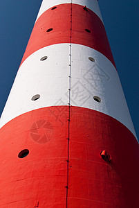 灯塔天空蓝色海岸季节泥滩红色导航白色海滩高清图片