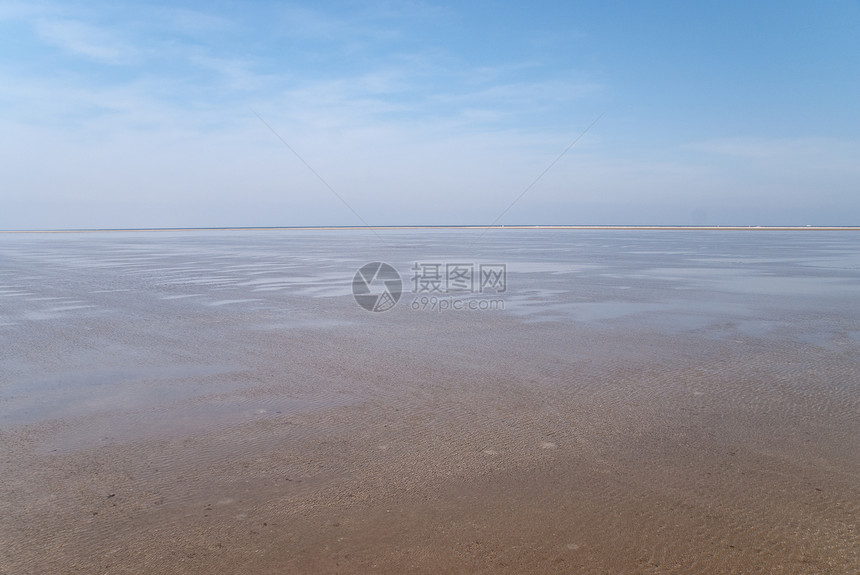 海滩沙滩天空泥滩海岸地平线季节图片