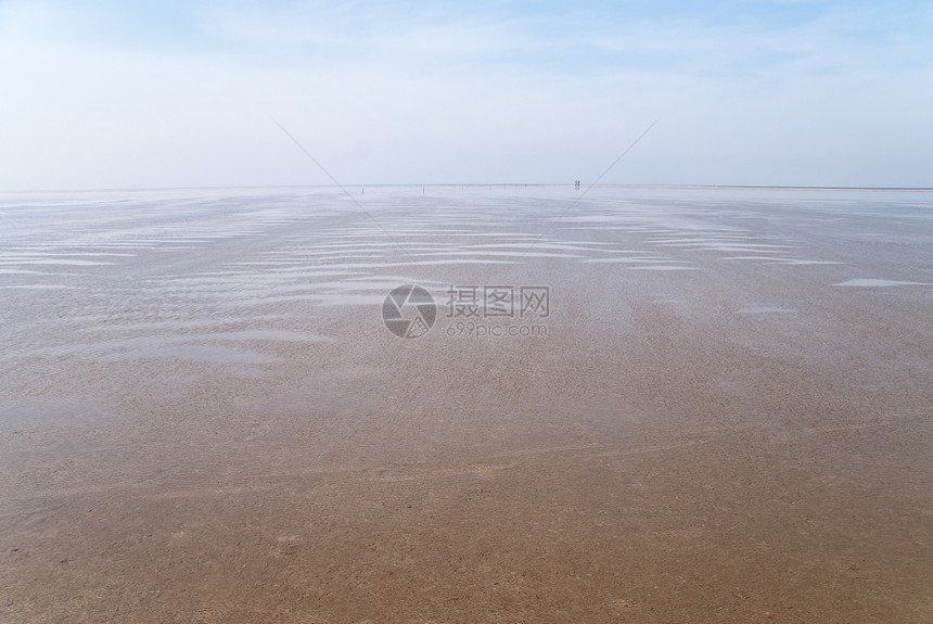 海滩沙滩季节泥滩天空海岸地平线图片