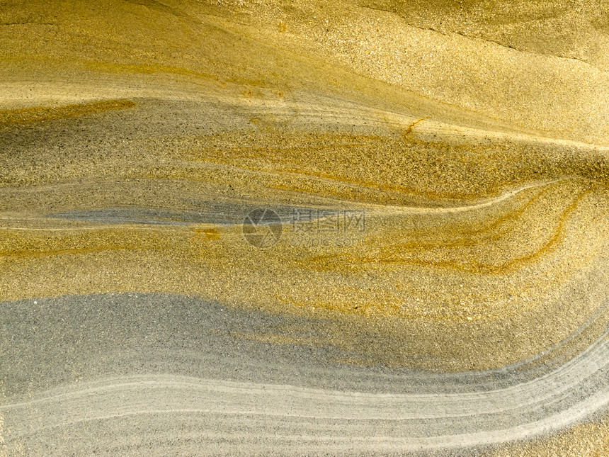 迭层沙石沉积岩平滑表面结晶材料图层圆形水晶沉积石头石英棕色夹杂物图片