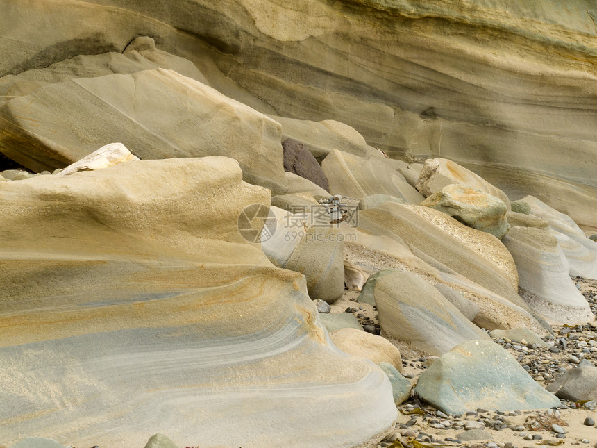 沙石沉积物平滑 以水四舍五入图片