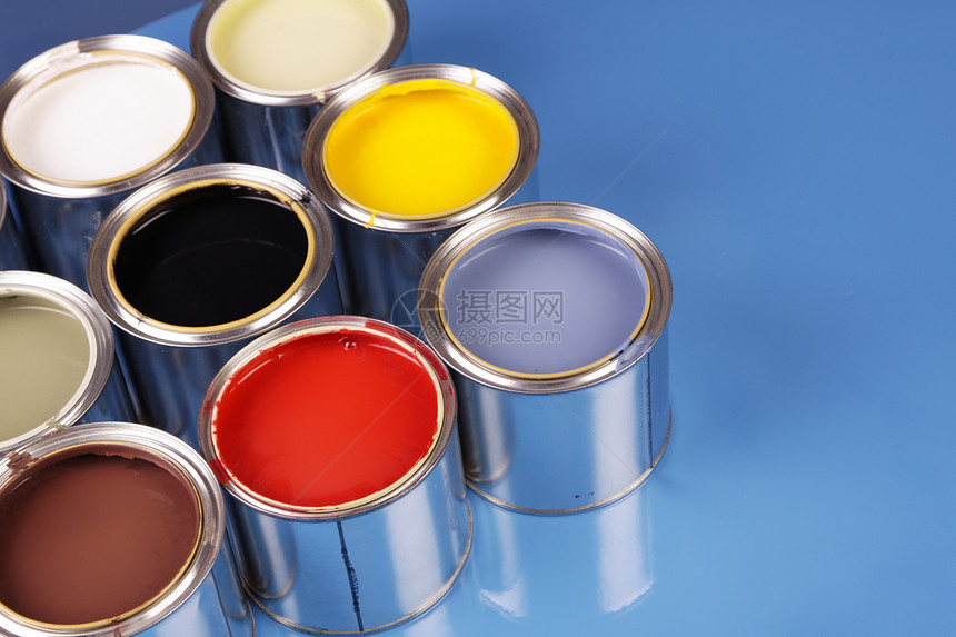 油漆罐黄色工作室装潢画家房子画笔创造力刷子颜料染料图片