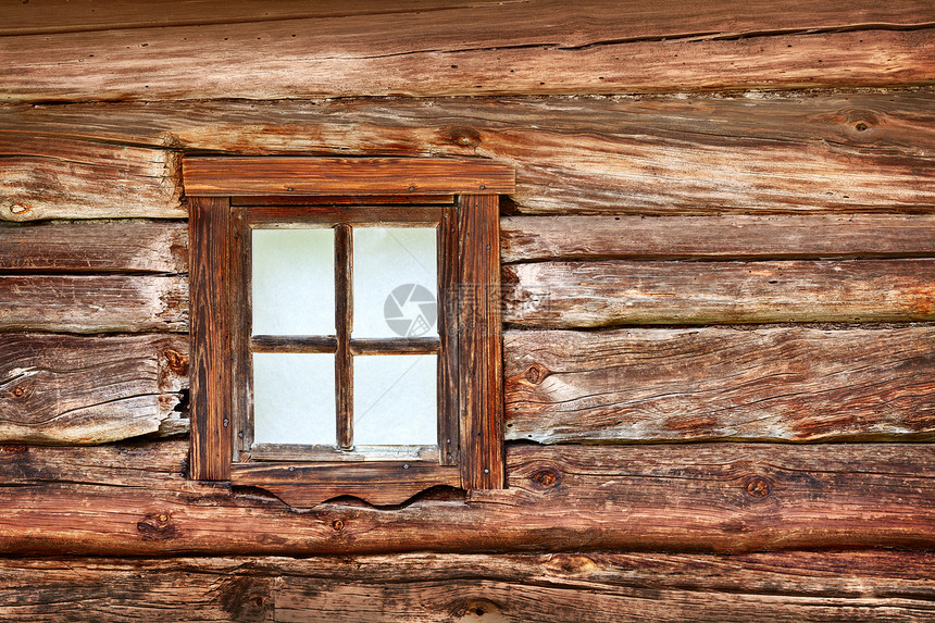 旧木墙上的小窗户图片