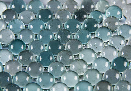 水晶球蓝色绿色水晶团体圆圈白色反射背景图片