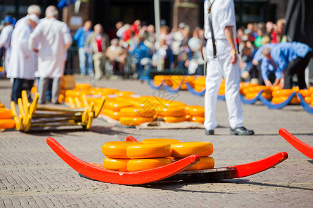 荷兰奶酪庆典立方体旗帜盘子橙子庆祝美食逗乐食物活动背景图片