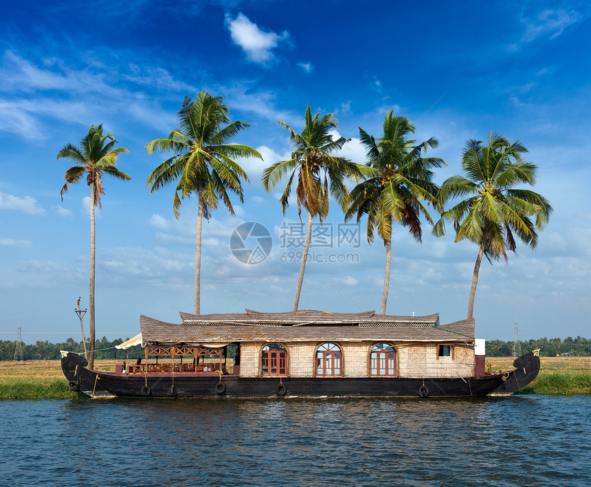 印度喀拉拉腊背水上的豪船死水日落正方形运河旅行风景渡船热带巡航棕榈图片