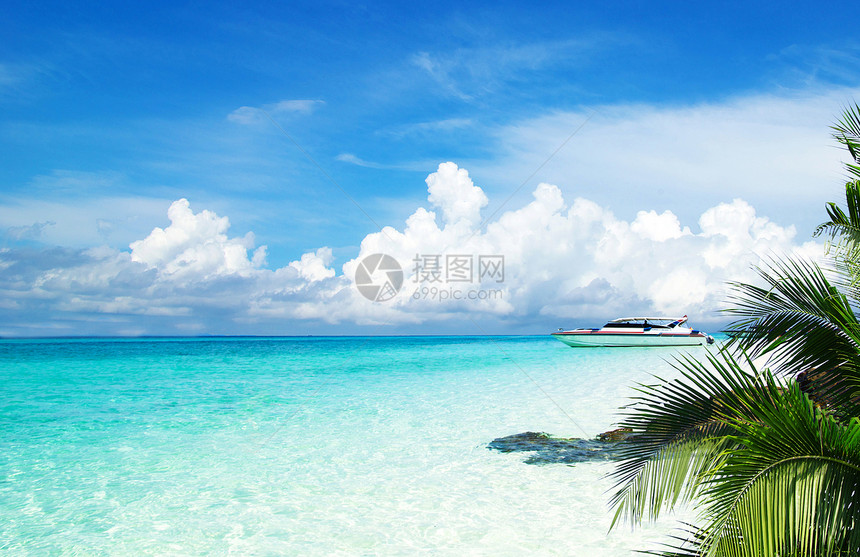 沙滩和热带海海浪冲浪阳光太阳海岸放松支撑旅行假期海洋图片