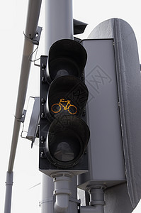 用于自行车的橙色交通灯背景图片