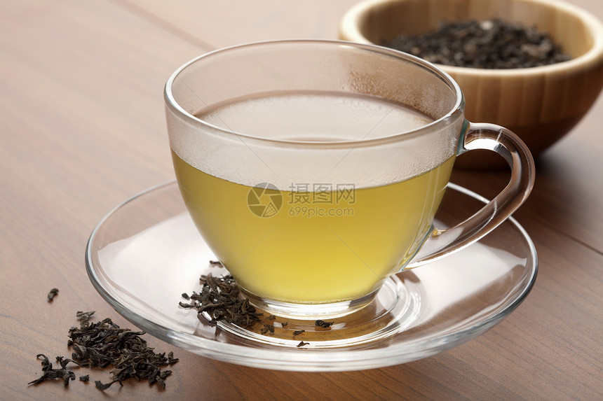 茶杯绿茶香气叶子飞碟芳香补品饮料咖啡店餐厅美食早餐图片