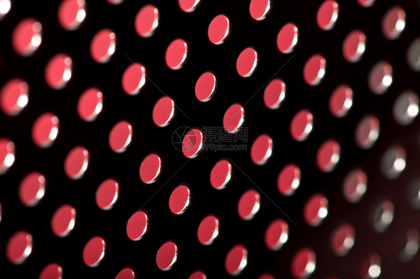 抽象金属纹理背景红色穿孔圆形合金工业高光粉色盘子控制板床单图片