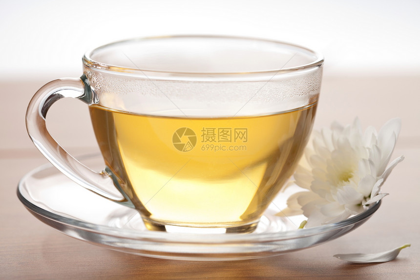 绿茶和白花叶子早餐补品餐厅芳香木头玻璃饮料美食香气图片