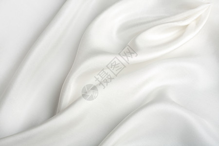 抽象白色丝绸背景组织曲线版税纺织品材料织物奢华折叠生产折痕背景图片