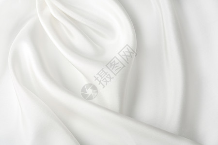抽象白色丝绸背景版税组织折痕织物折叠纺织品材料奢华投标曲线背景图片