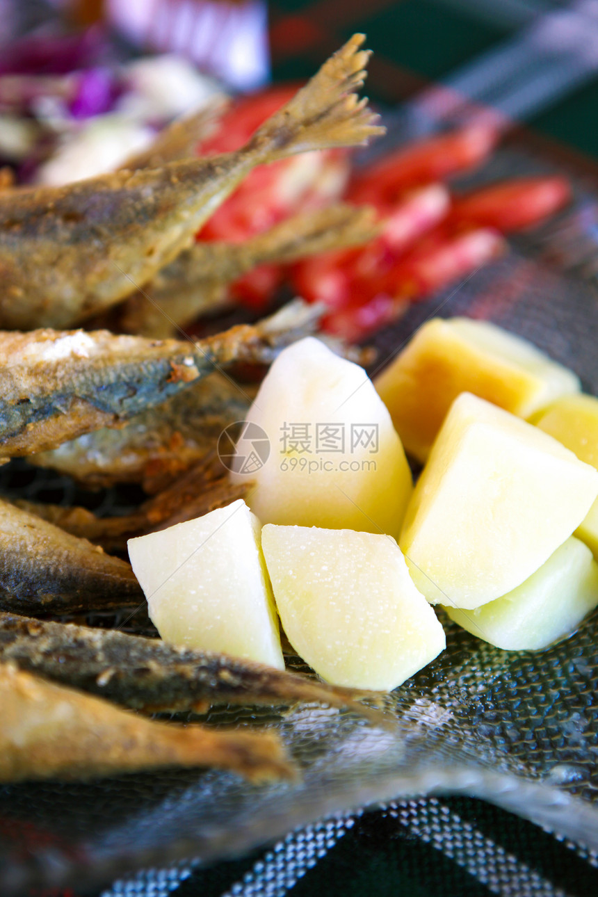 炸鱼和薯片饮食宏观海鲜鱼片盘子土豆小吃餐厅香菜鳕鱼图片