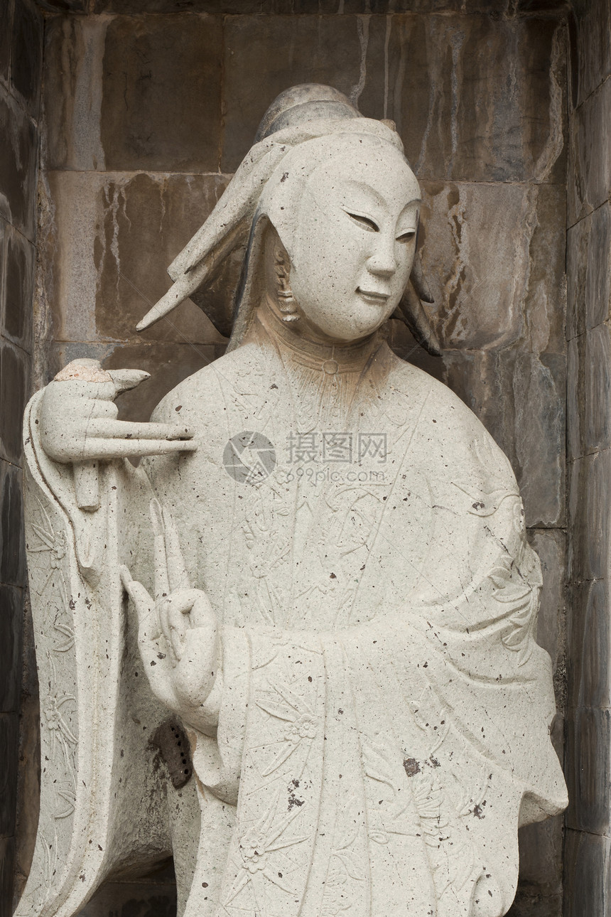 八个神像之一怜悯道士宗教上帝女性偶像菩萨精神雕刻文化图片