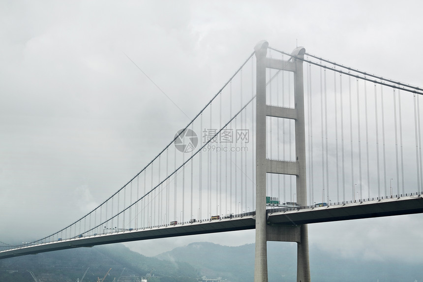 烟雾中刺眼马桥景观日出魔法射线日落城市海洋运动场景石头图片