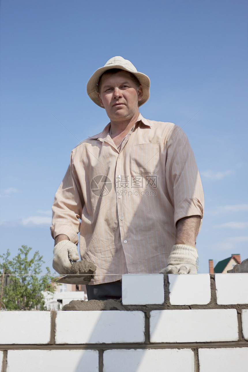 Bricklayer 建造墙壁建设者工具水泥男人石工建筑学石头手臂职业手套图片