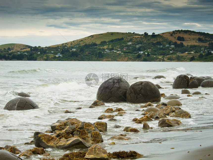 新西兰南部东海岸浅滩天空环境侵蚀晴天海洋岩石巨石沿海海岸线图片