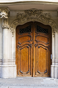住宅城市大楼的入口门关口装饰品建筑学历史木头装饰金属黑色古董玻璃建筑背景图片