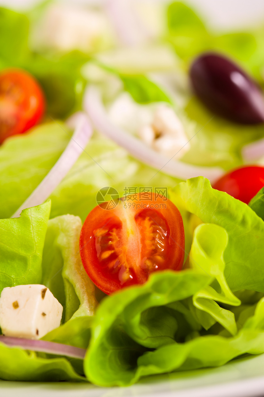 新鲜希腊沙拉午餐香料饮食来源洋葱绿色美食奶制品餐具食物图片
