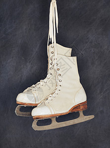 旧滑雪板皮革蕾丝运动滑冰白色冰鞋女性鞋带背景图片