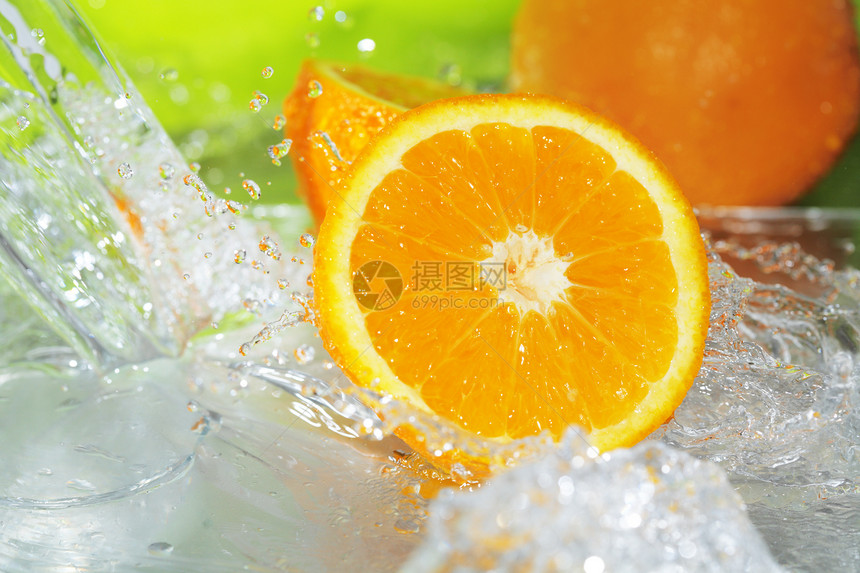 橙花食物飞沫橙子水果飞溅液体图片