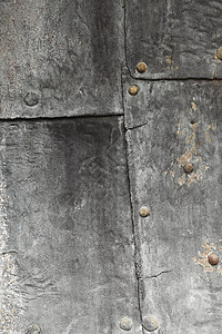 旧门铆钉金属背景图片
