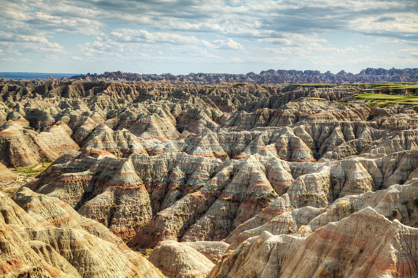 美国南达科塔巴德兰国家公园风景孤独荒地石头旅行侵蚀砂岩红色天空全景荒野图片