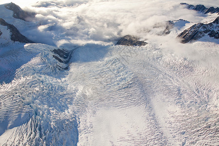 冰川旅游蓝色洞穴远景顶峰荒野环境直升机国家公园高清图片