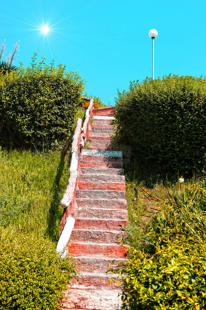 通往太阳的楼梯岩石脚步摄影黑子公园金子色彩宗教人行道风景图片