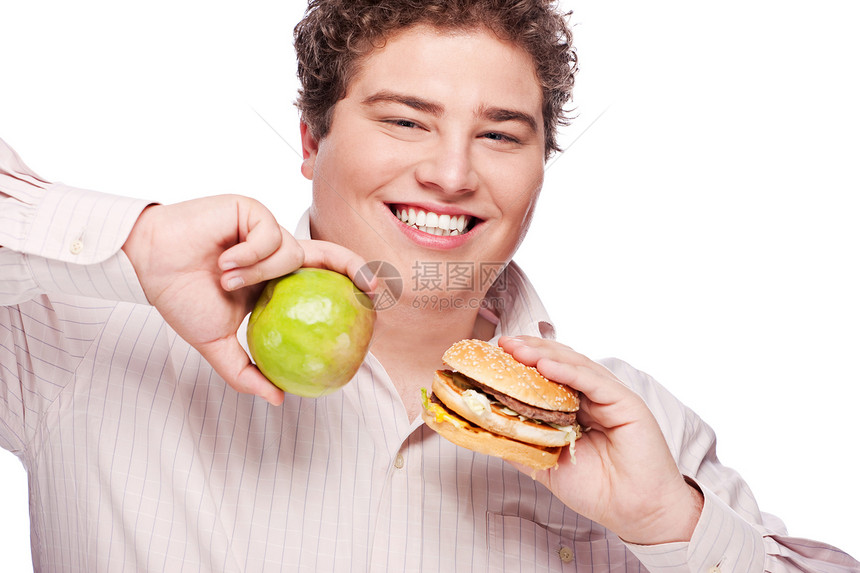 胖胖男人拿着苹果和汉堡包小吃脂肪饥饿晚餐美食午餐烧烤食欲水果面包图片