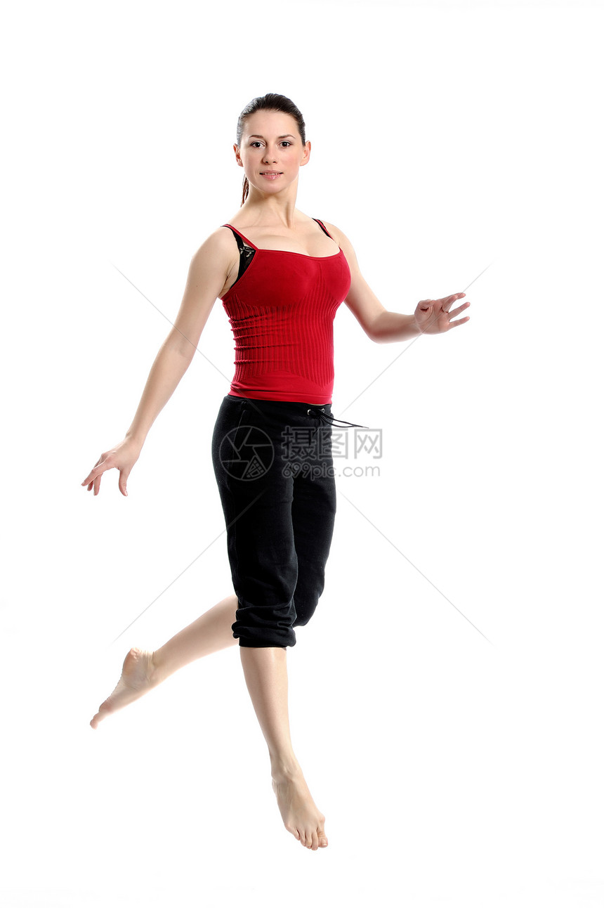 身穿运动服跳过白色的女生体操训练运动员女性自由女士飞跃乐趣成人女孩图片