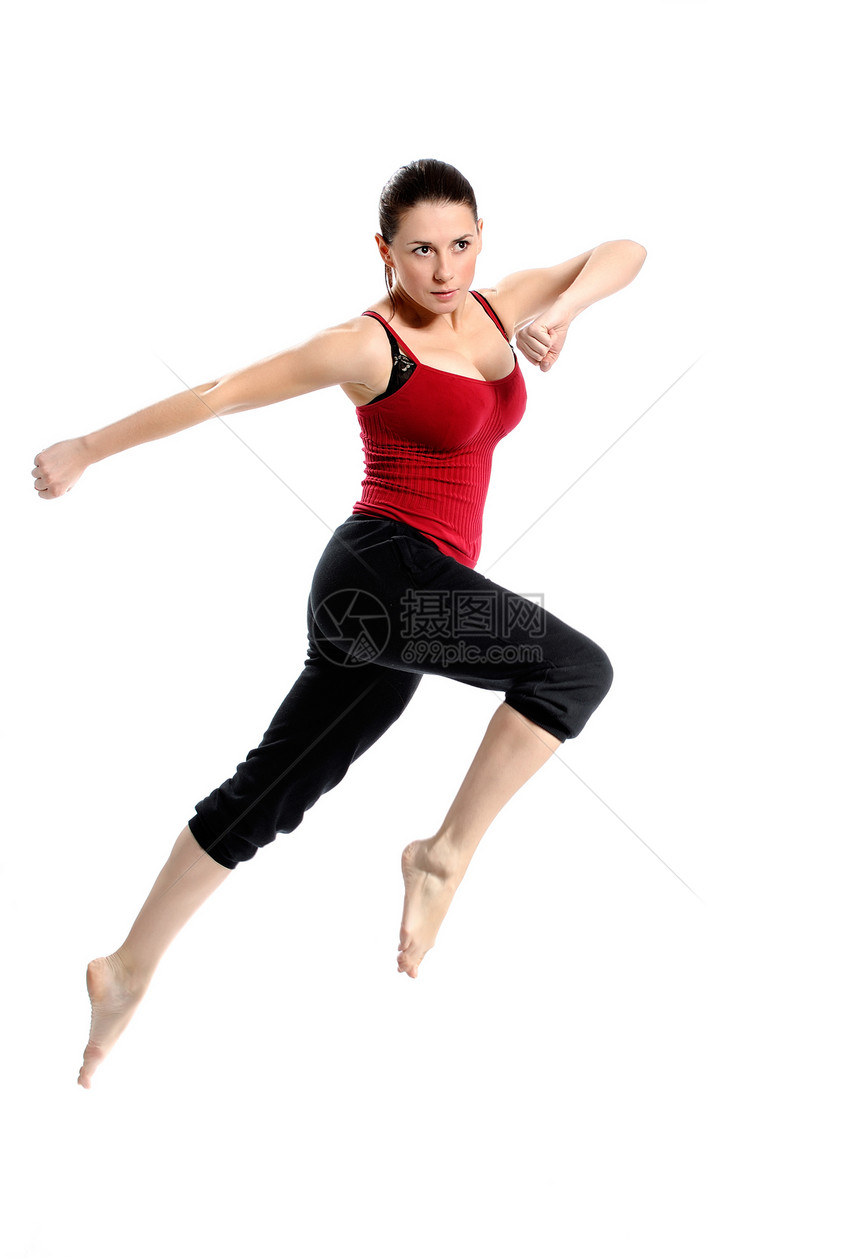 身穿运动服跳过白色的女生女性体操女士衣服运动装活动成人有氧运动乐趣黑发图片