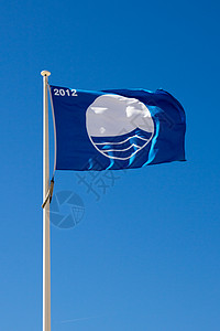 蓝旗海滩飞行天空桅杆认证联盟蓝色奖项背景图片